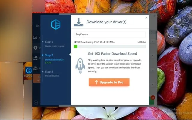 Cách cài và sử dụng Driver Easy đơn giản, chi tiết 11 Hệ thống đang download Driver về thiết bị